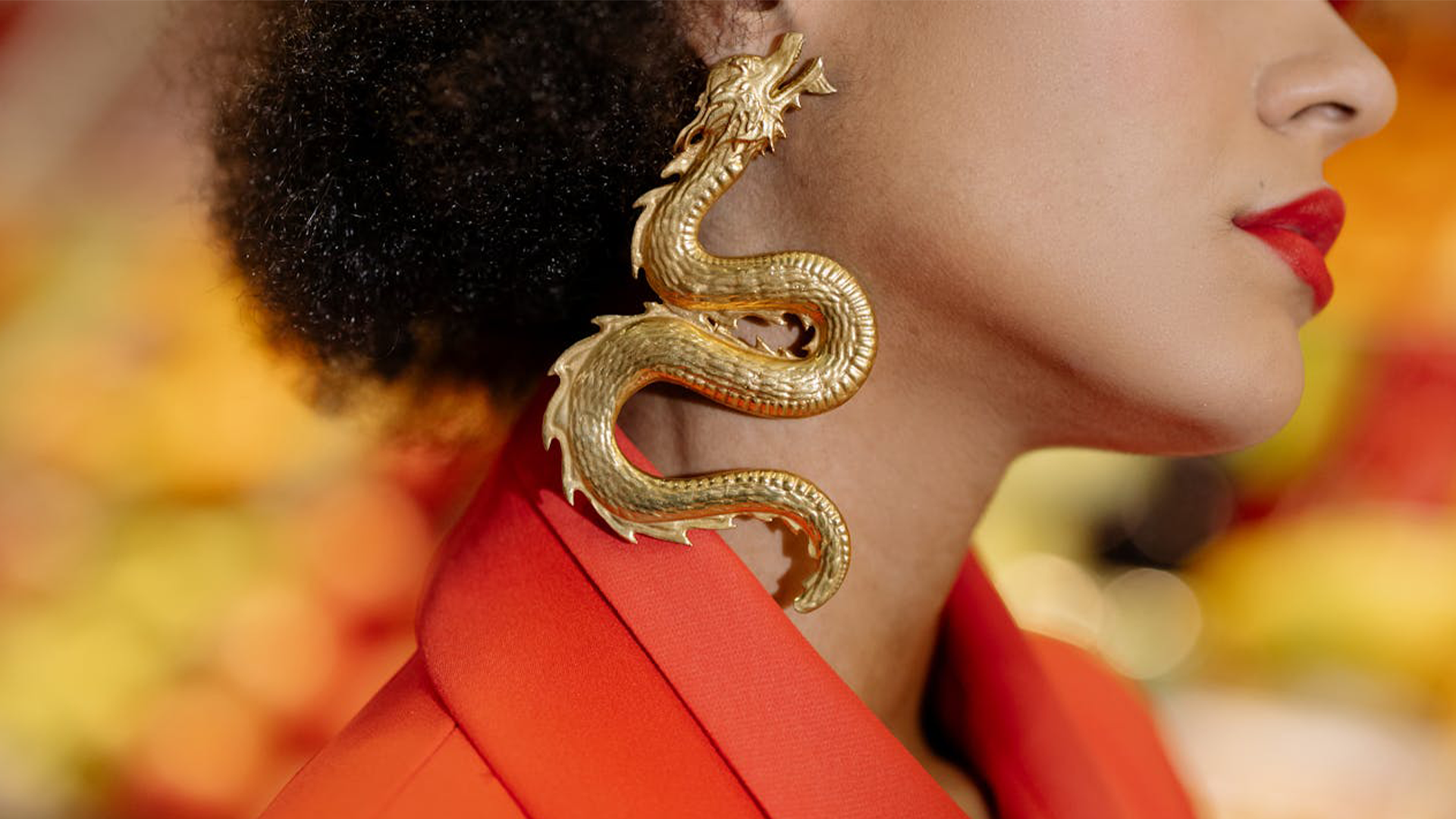 Dragon earring, photo courtesy CottonBroStudio and Pexels.