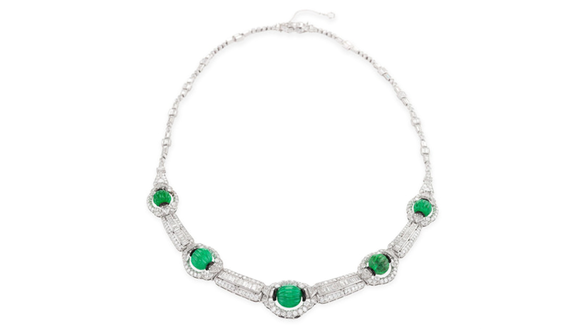 Old European diamonds (approximately 11.10-carats), carved emerald beads (approximately 19-carats), enamel and platinum necklace, circa 1930 courtesy Macklowe Gallery (@macklowegallery).