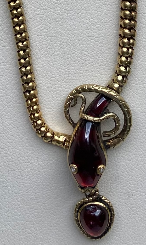 Antique garnet, diamond and 15-karat gold snake necklace, circa 1860, courtesy Michael Gardner.