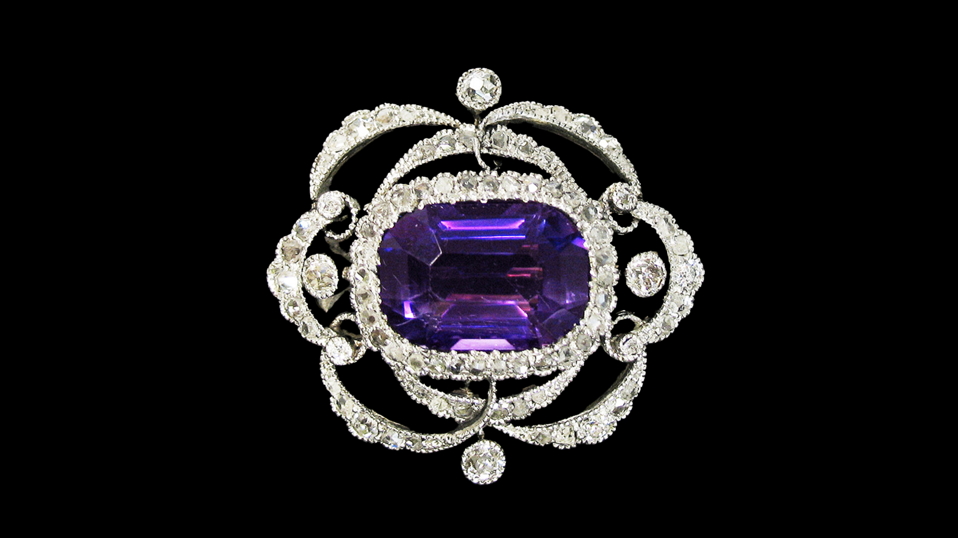 Edwardian diamond, 6-carat Siberian amethyst, platinum and gold brooch, courtesy J. & S.S. DeYoung.