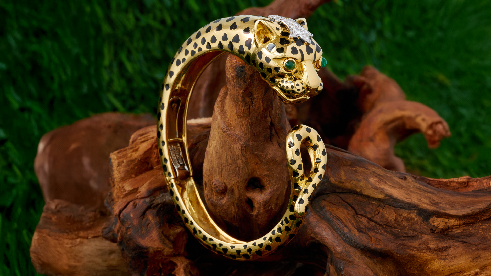 Diamond, emerald, 18-karat gold and enamel tiger bracelet signed David Webb, courtesy JSFearnley (@jsfearnley).
