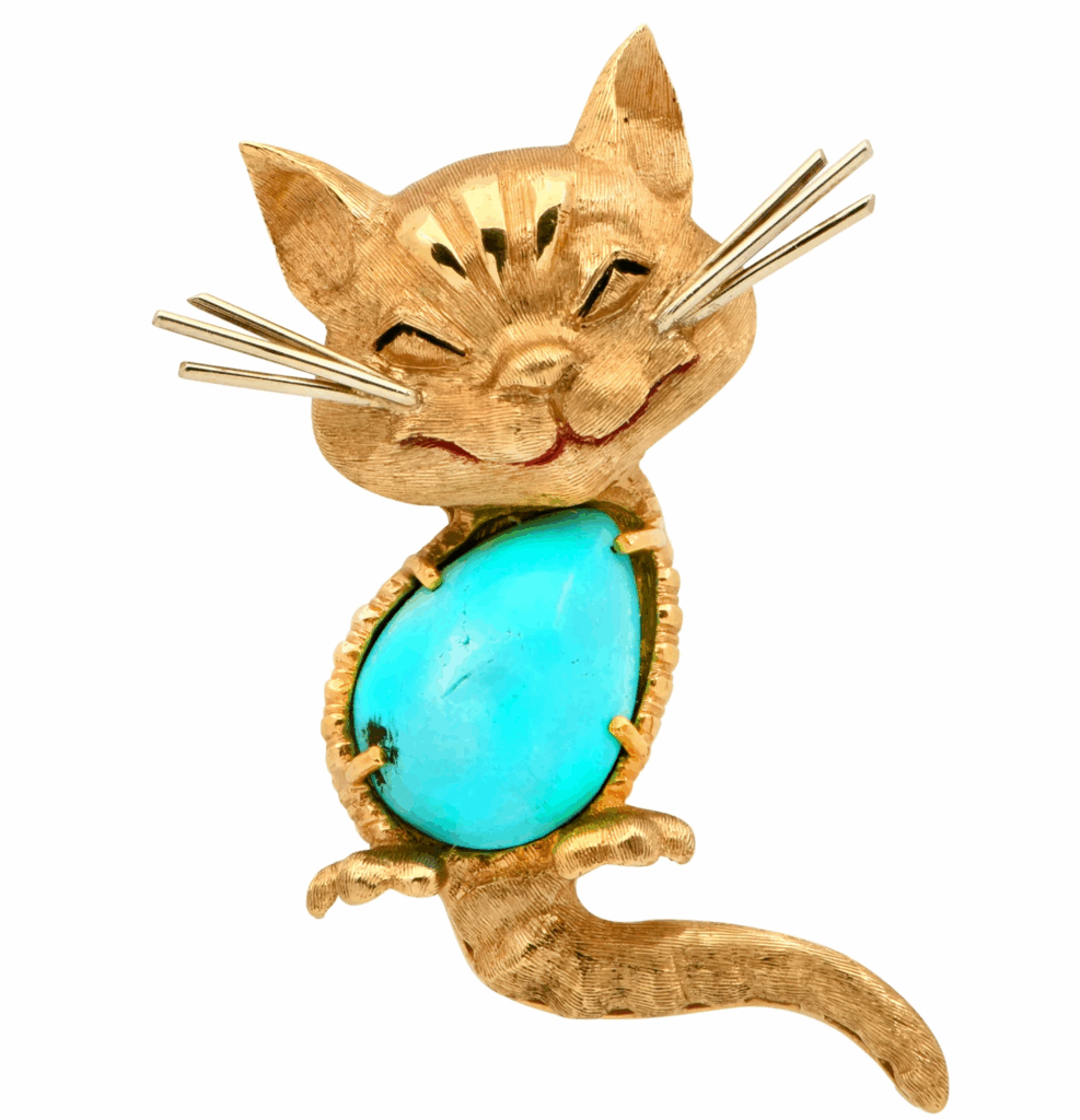 Turquoise and 18-karat gold cat brooch, signed Cartier, courtesy Vivid Diamonds & Jewelry (@vividdiamonds).